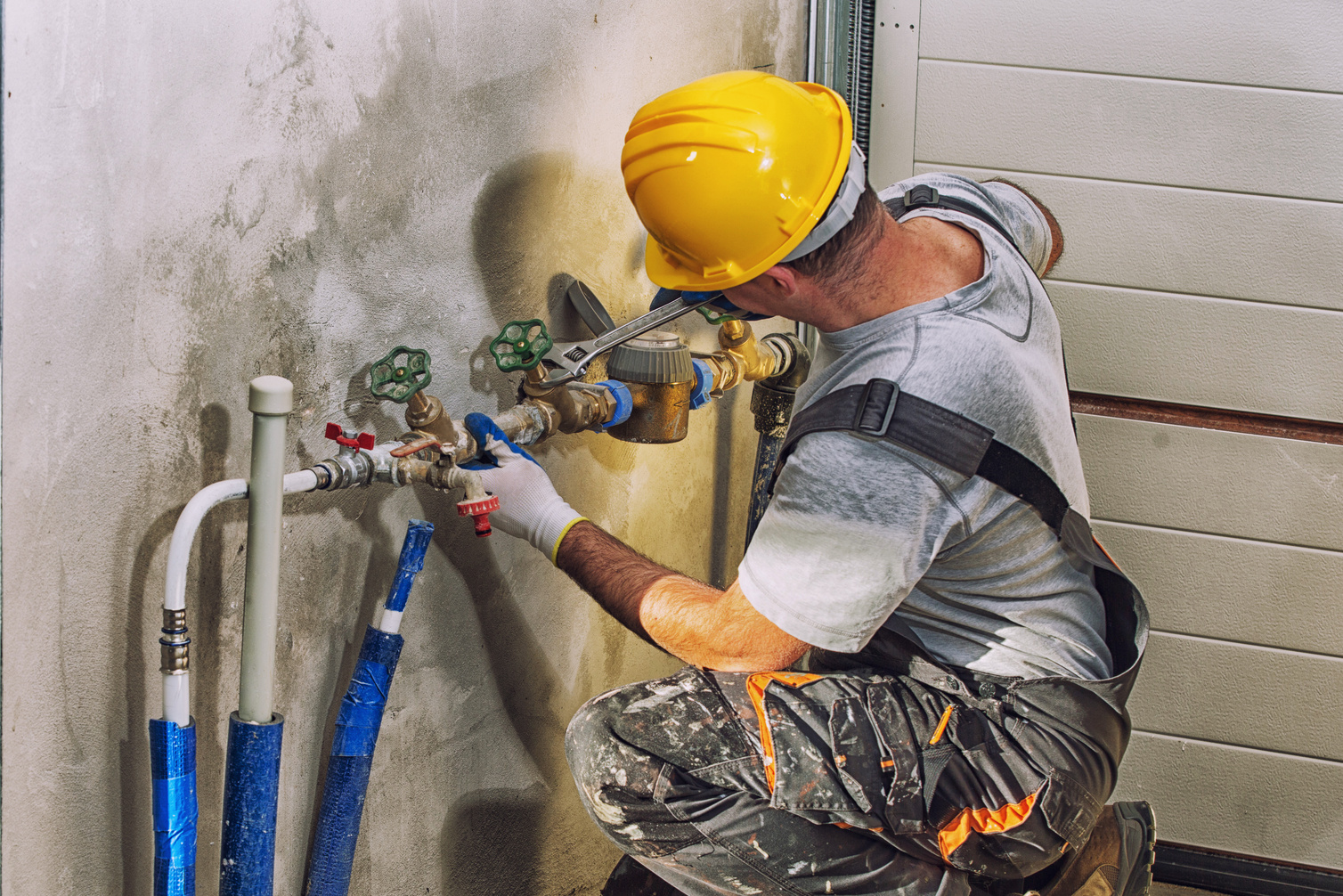 plumber working on collinsville project